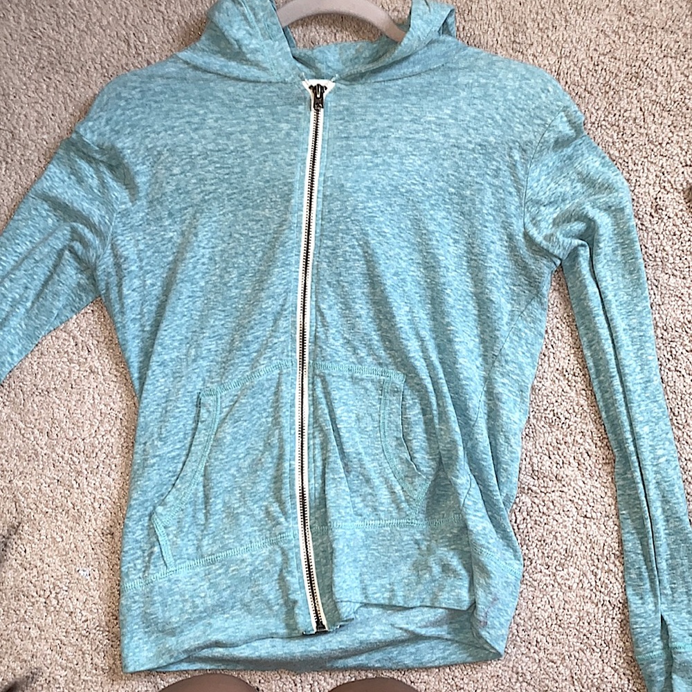 teal/blue sweater